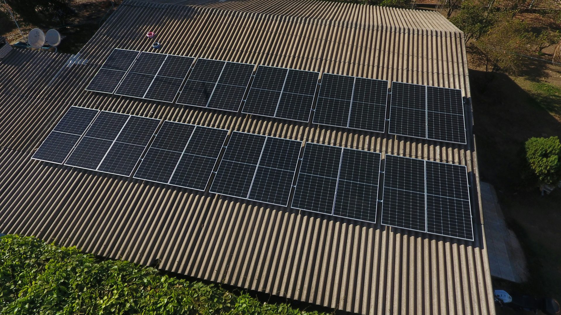 Solar panels are installed on a rooftop.
